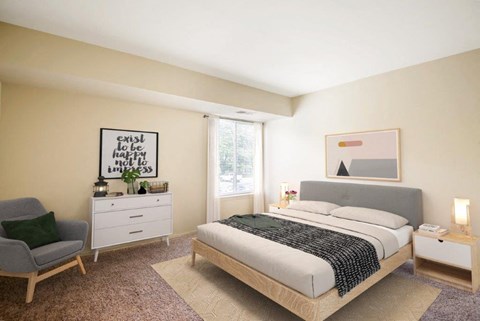 a bedroom with a bed and a dresser and a window