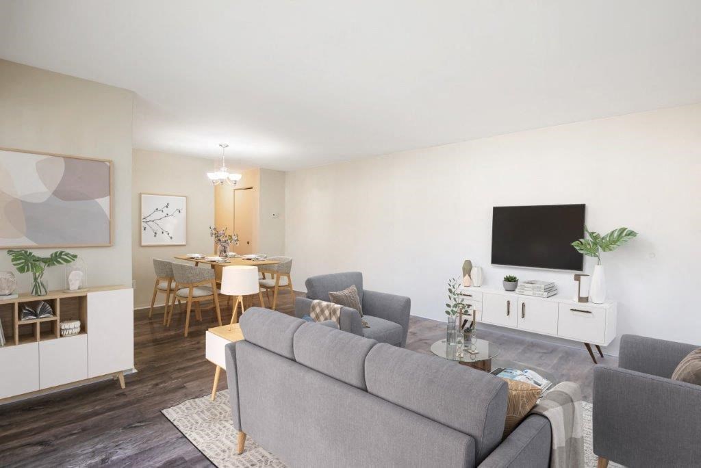 a living room with a couch and a tv