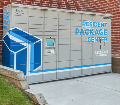 a door to the resident package center outside of a brick building