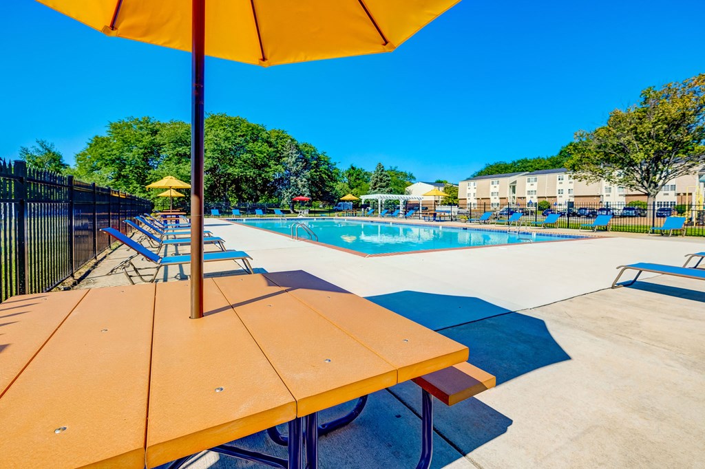 the swimming pool at the enclave apartments