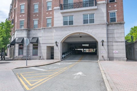 the entrance to the parking garage of the building