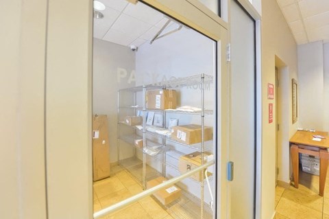 a room filled with boxes and a glass door