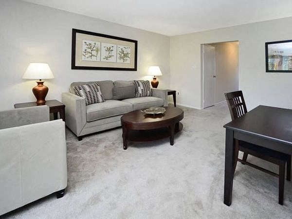 a living room with a couch and a table