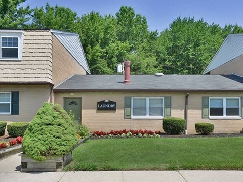 a house with a lawn in front of it