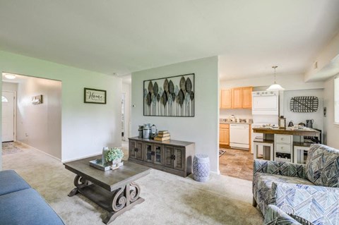 a living room with a couch and a table