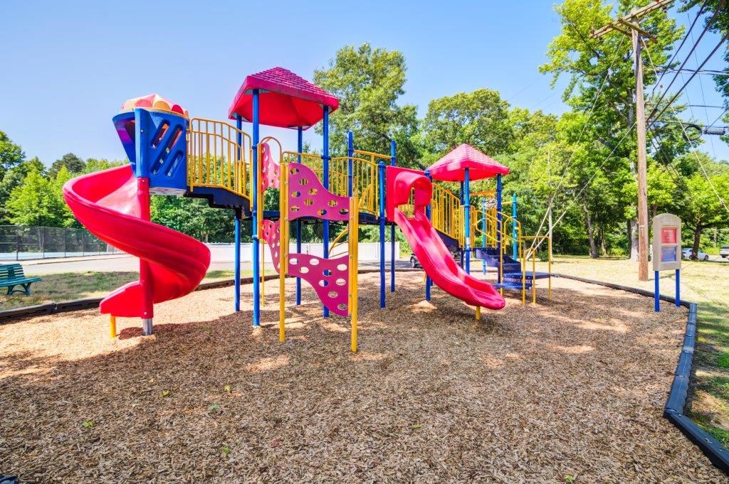 our children s playground is equipped with a variety of equipment including slides and swings