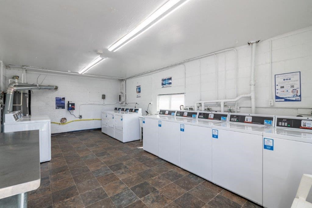 a kitchen with a bunch of machines in it