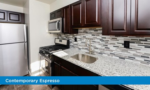 a kitchen with a sink and a refrigerator