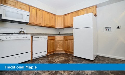 a kitchen with white appliances and wooden cabinets