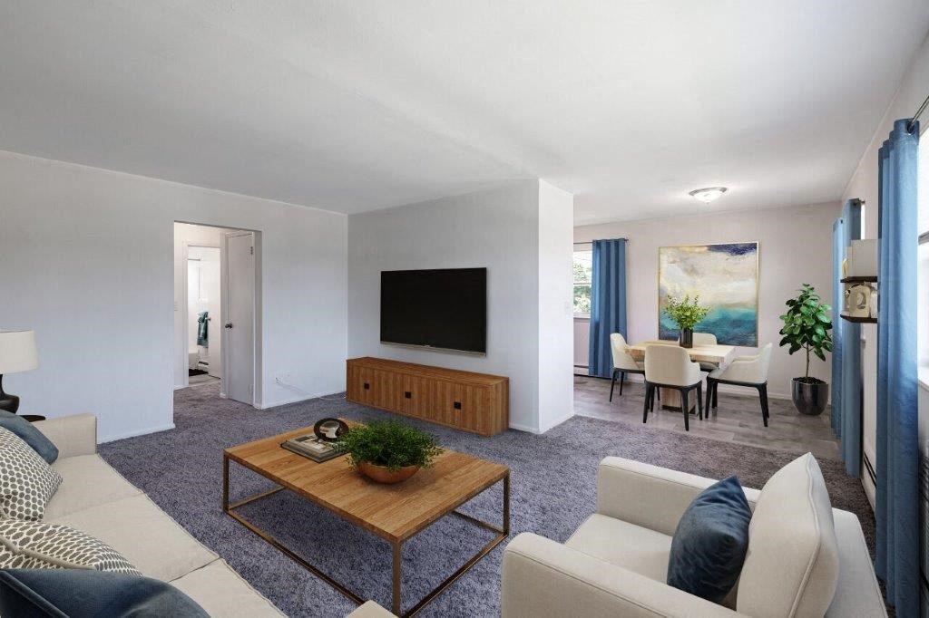 a living room with a couch and a coffee table