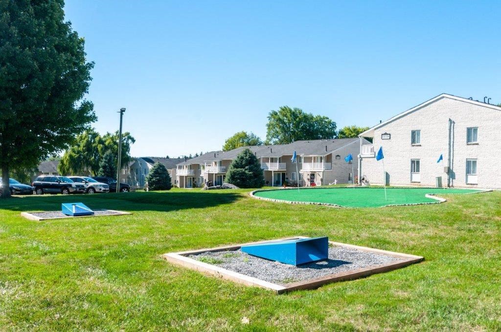 our apartments have a mini golf course in the grass