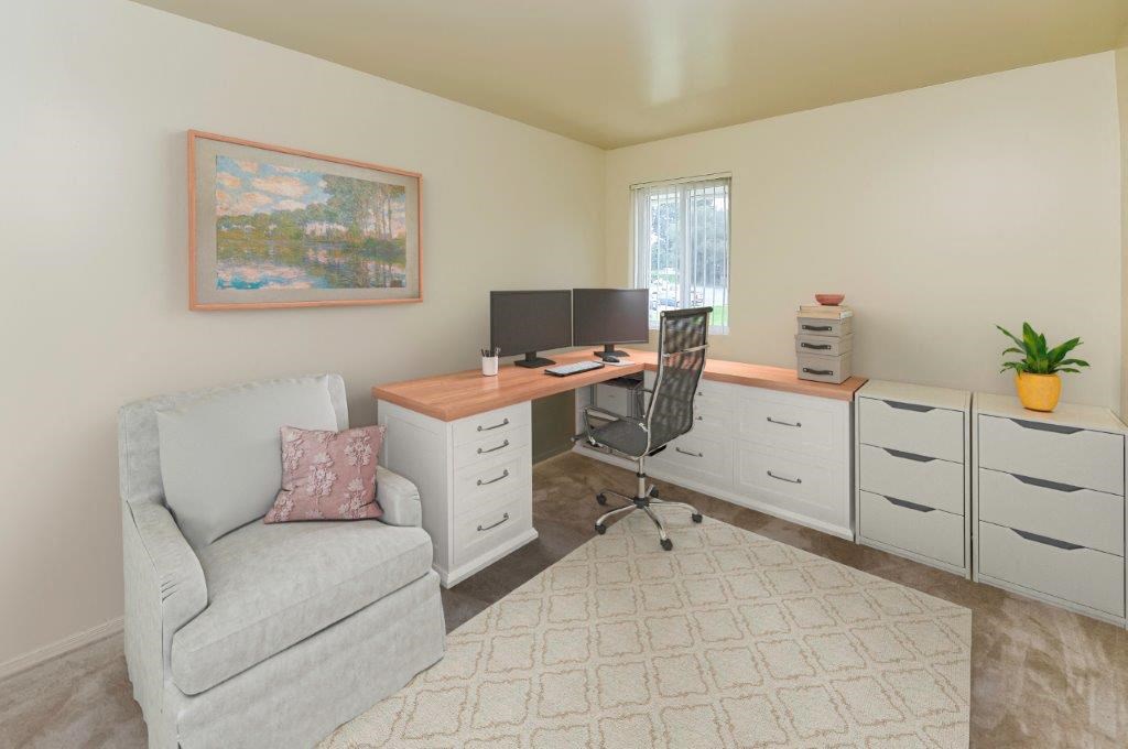 a home office with a chair and a desk