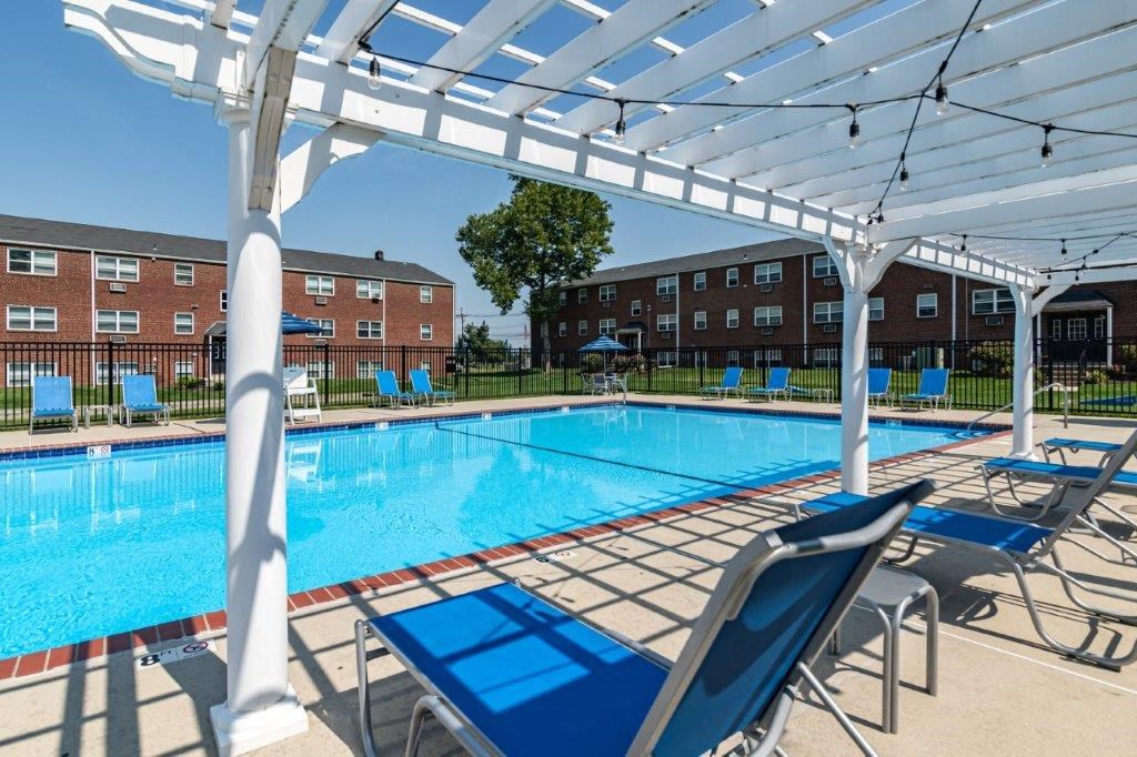 our apartments have a large pool and lounge chairs