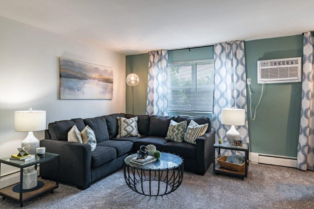 a living room with a couch and a table