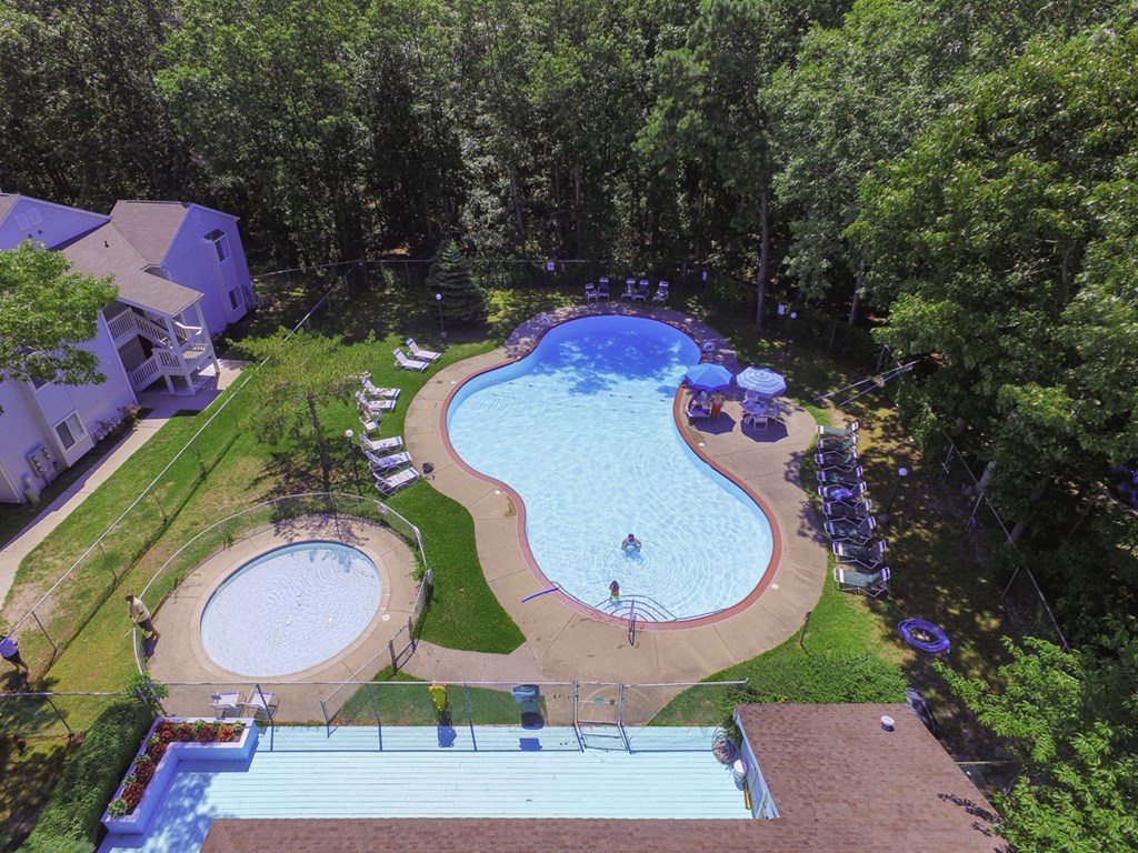 a swimming pool is shown from above above a resort style pool