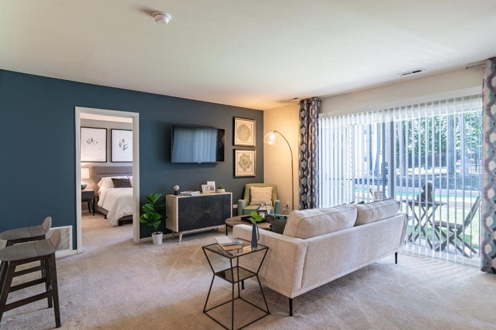 a living room with a couch and a television