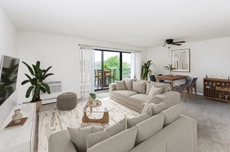 a living room with a couch and a tv