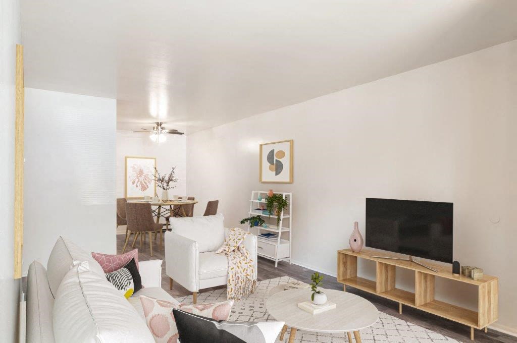 a living room with a couch and a tv