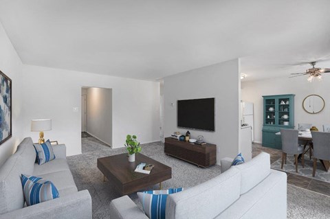 a living room with a couch and a television