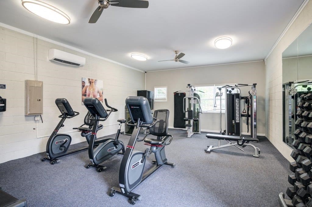 the gym in the owners home has a lot of exercise equipment