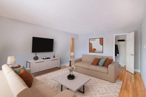 a living room with a couch and a table