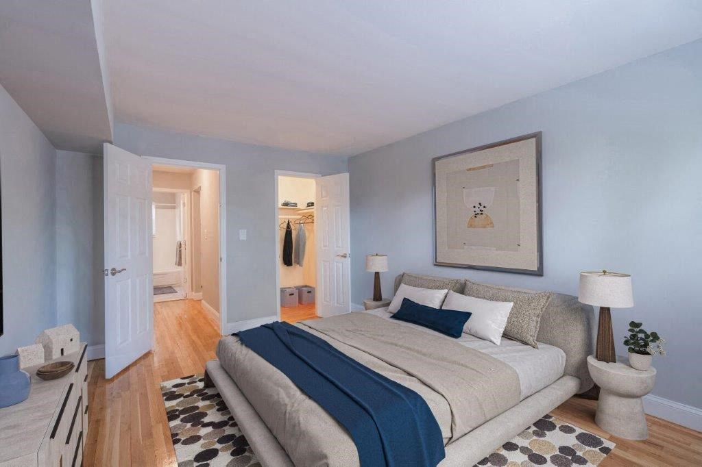 a bedroom with a bed and a closet
