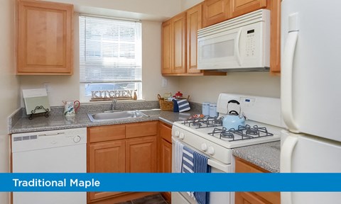 a kitchen with a stove microwave and sink