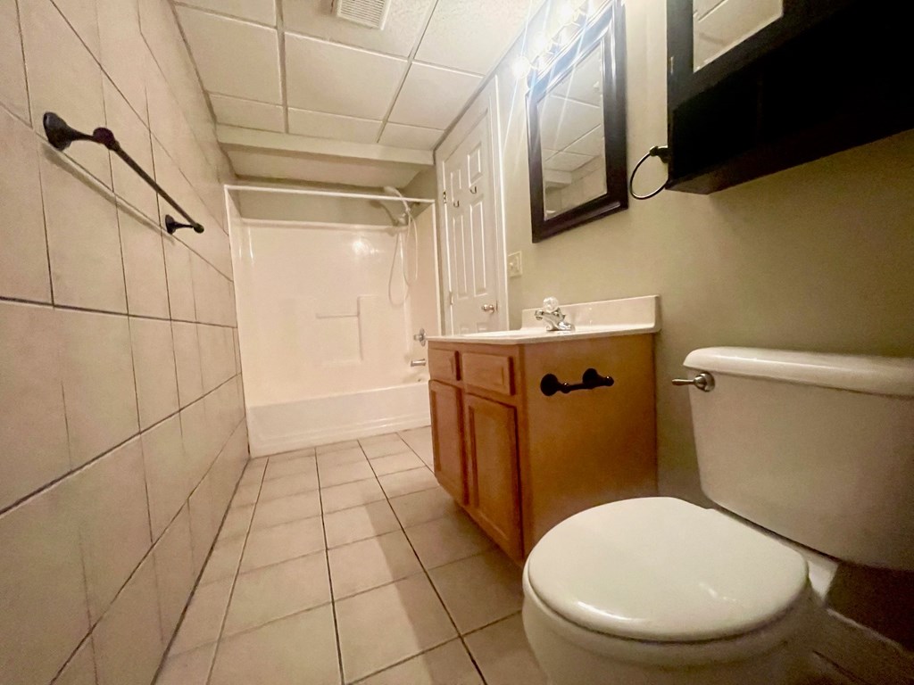 a bathroom with a toilet and a sink