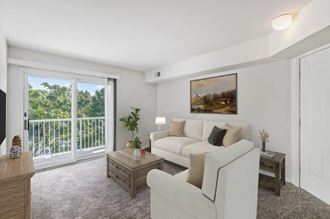 a living room with a couch and a table