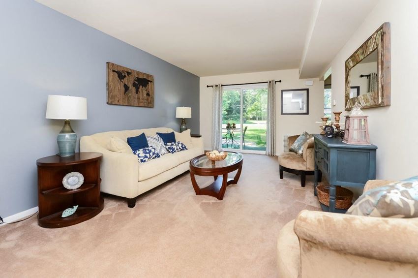 a living room with a couch and a table