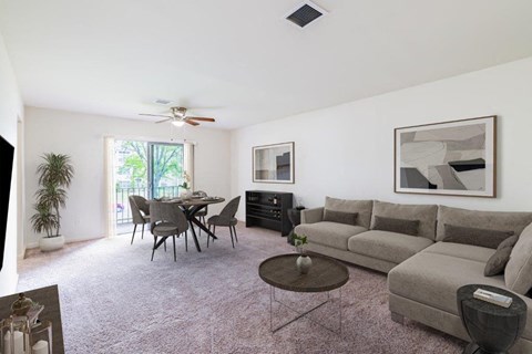 a living room with a couch and a table