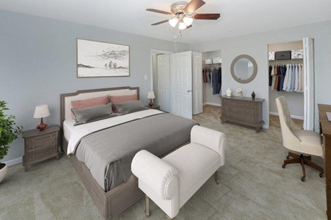 a bedroom with a bed and a closet