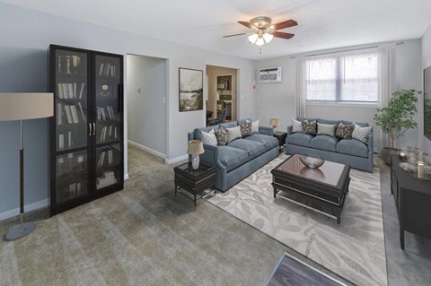 a living room with a couch and a table