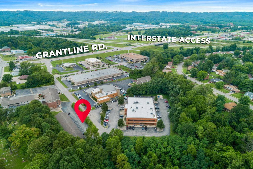 an aerial view of the parking lot at grantline rd with a red heart
