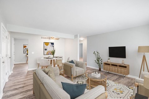 a living room with a couch and a tv