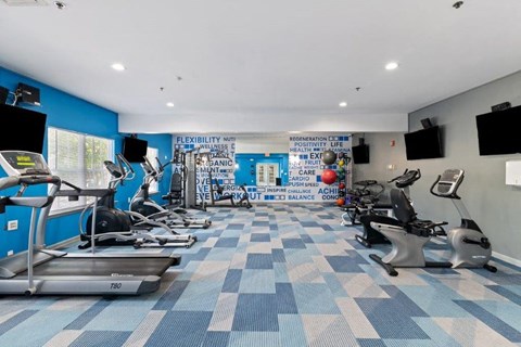 the gym in our apartments is equipped with cardio machines and televisions