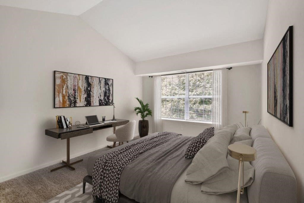 Staged bedroom with large window