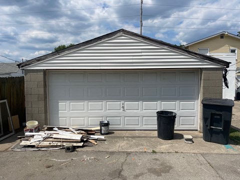 a new garage door is being installed on a house