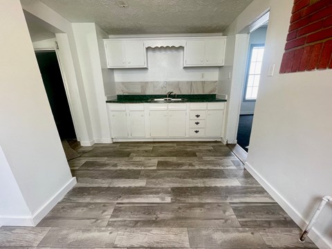 a view of the kitchen from the living room