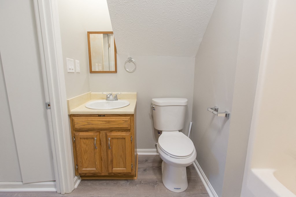 a small bathroom with a toilet and a sink