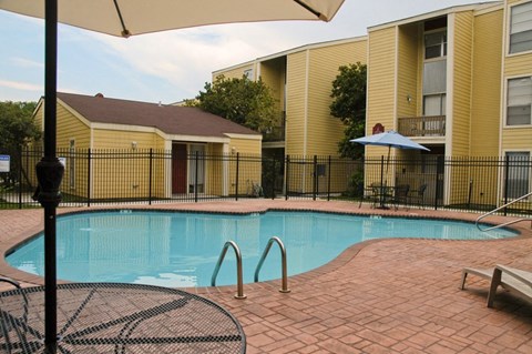 the swimming pool at the apartments for rent