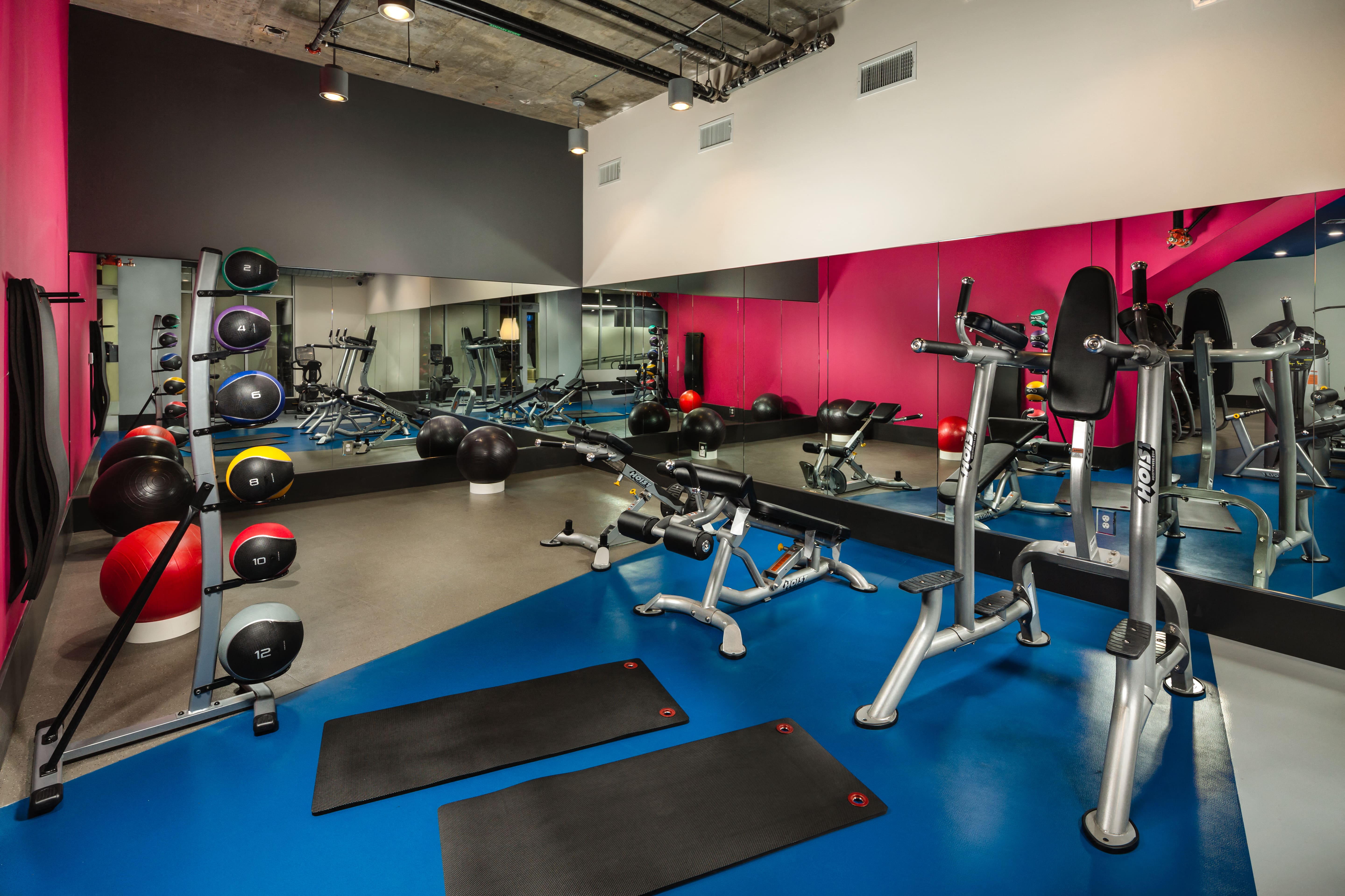 topaz fitness center with yoga mat and weight balls