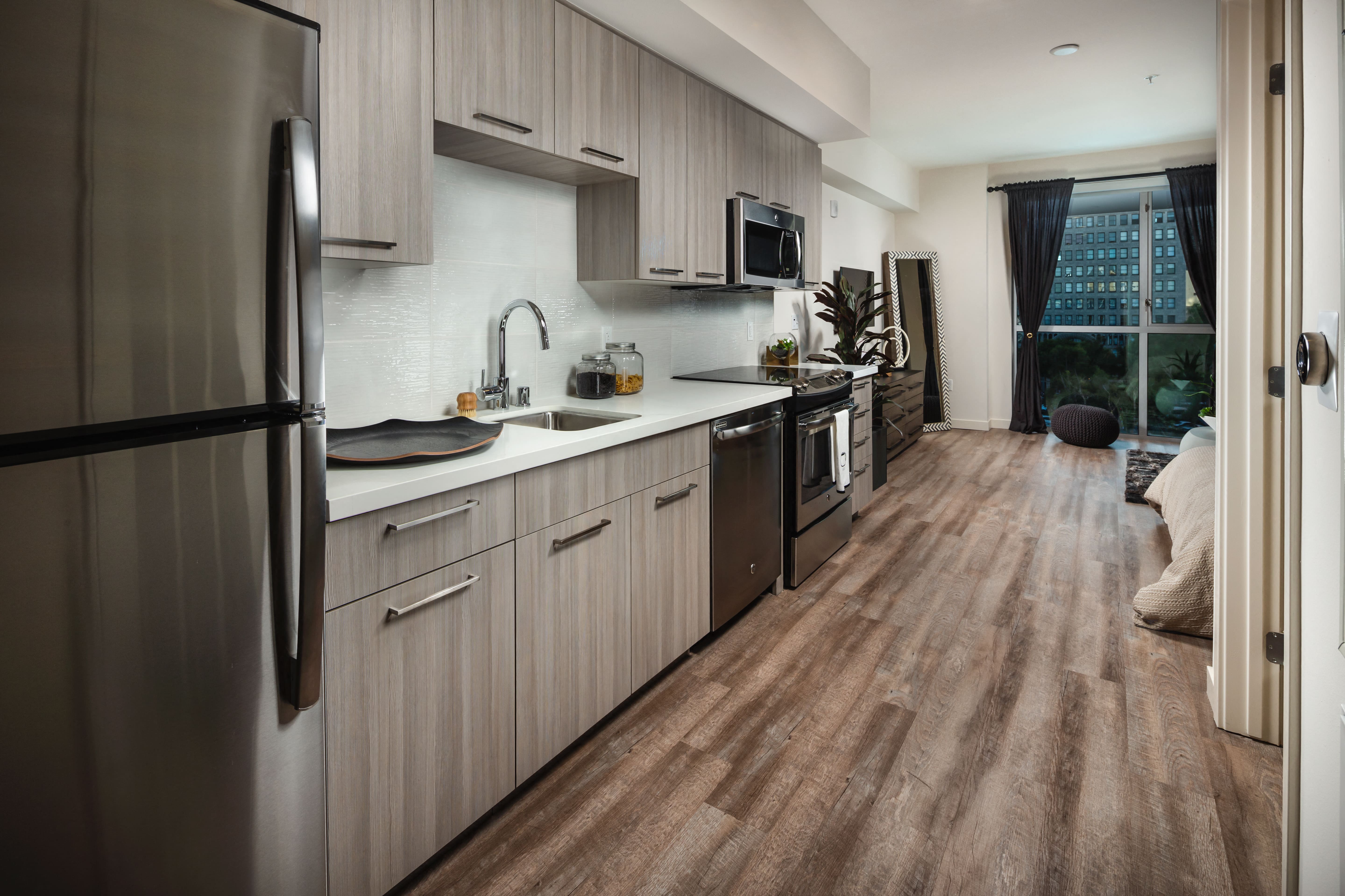 model kitchen with stainless steel appliances