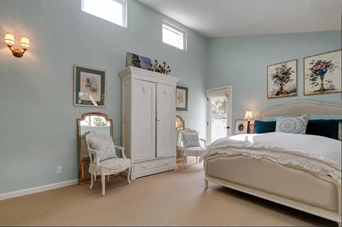 bedroom with white chair