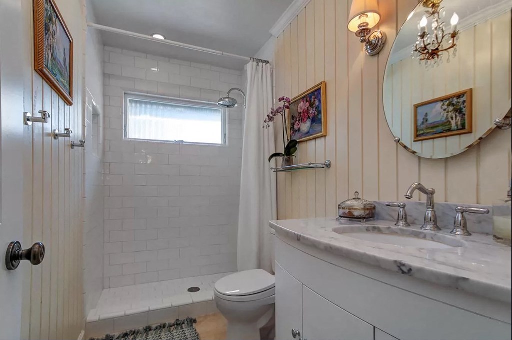 bathroom with small square window