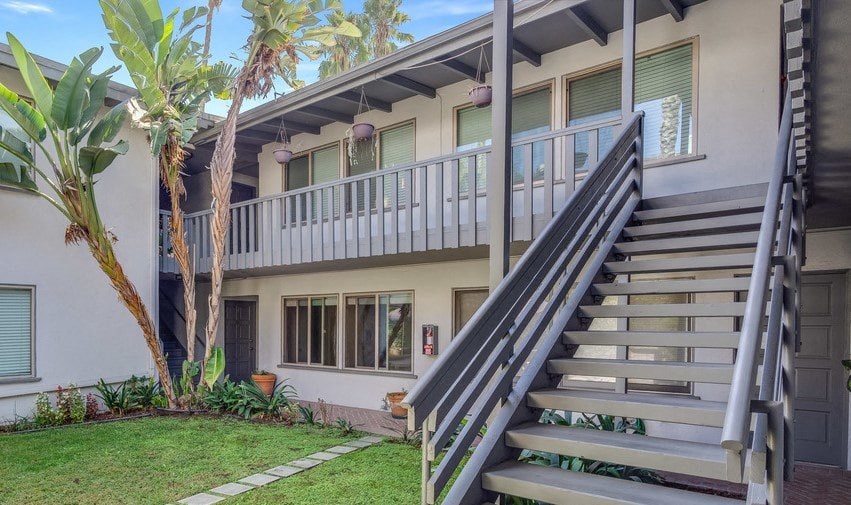 A house with a staircase leading to the second floor.