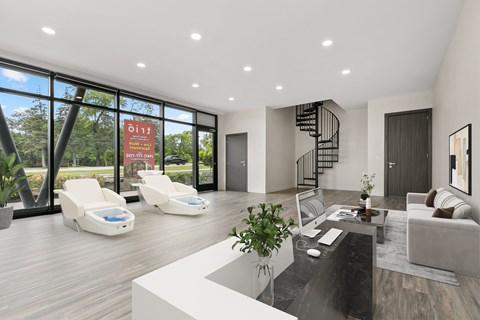 A modern living room with a spiral staircase and a view of the outdoors.