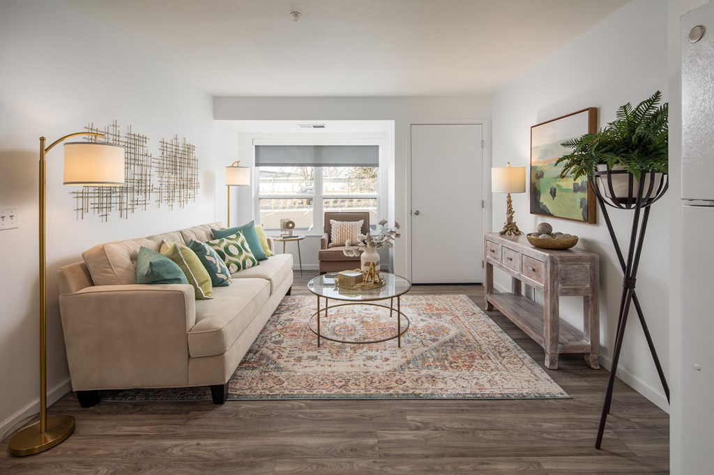 a living room with a couch and a table