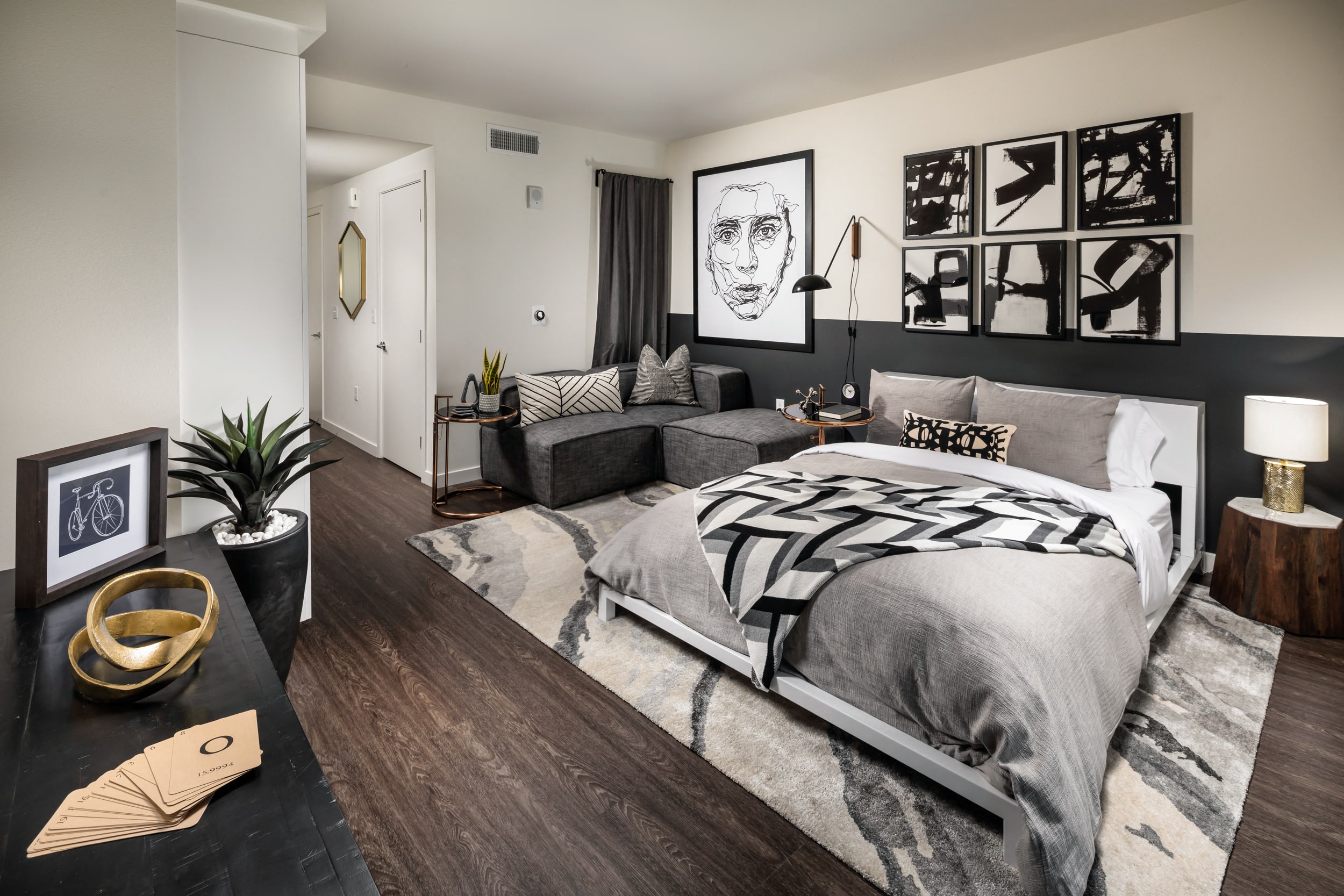 Bedroom wtih wall decor and dresser