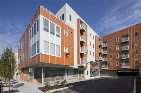 a large building with a street in front of it
